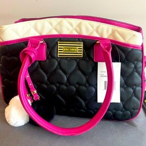 Brand new Betsey Johnson medium size purse.